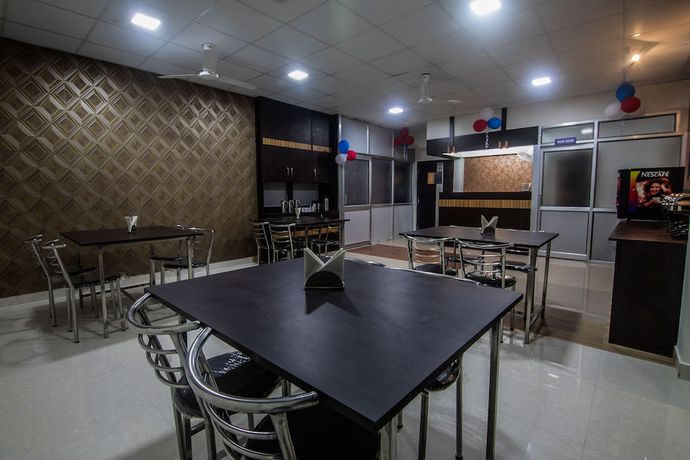 Imagen del bar/restaurante del Hotel OYO 15700 Spectrum Residency. Foto 3