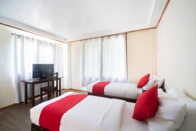 Imagen de la habitación del Hotel OYO 162 The West Inn. Foto 16