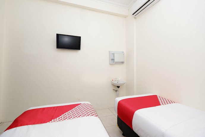 Imagen de la habitación del Hotel OYO 1620 Sion Family Residence. Foto 2