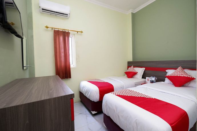 Imagen de la habitación del Hotel OYO 1620 Sion Family Residence. Foto 3