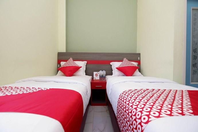 Imagen de la habitación del Hotel OYO 1620 Sion Family Residence. Foto 4