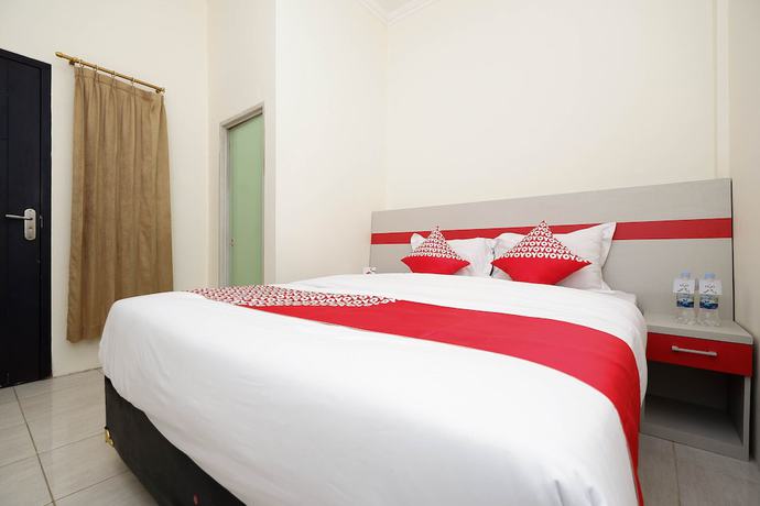 Imagen de la habitación del Hotel OYO 1620 Sion Family Residence. Foto 5