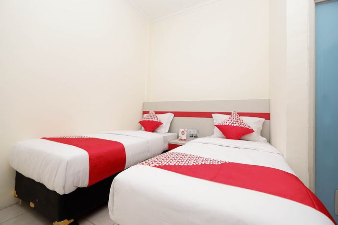 Imagen de la habitación del Hotel OYO 1620 Sion Family Residence. Foto 6