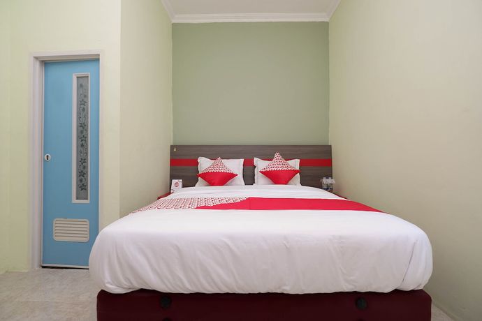 Imagen de la habitación del Hotel OYO 1620 Sion Family Residence. Foto 12