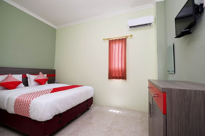 Imagen de la habitación del Hotel OYO 1620 Sion Family Residence. Foto 14