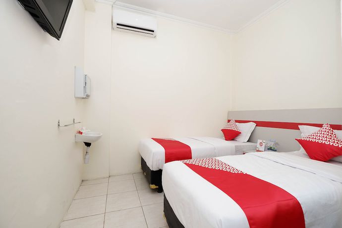 Imagen de la habitación del Hotel OYO 1620 Sion Family Residence. Foto 15
