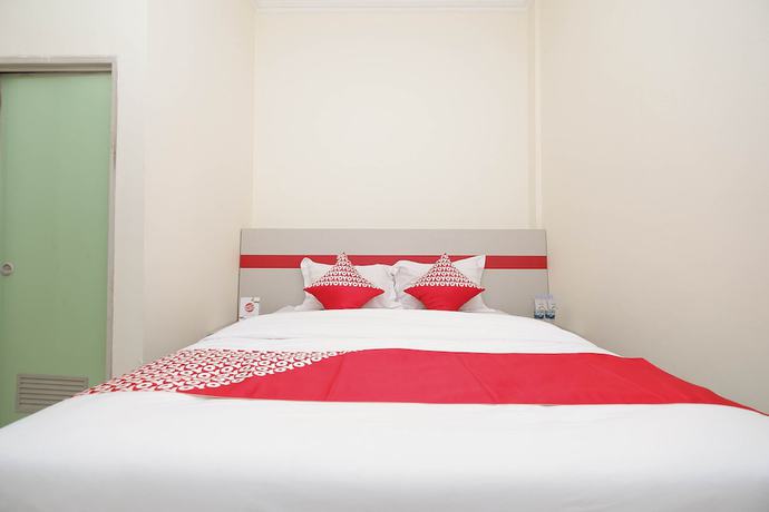 Imagen de la habitación del Hotel OYO 1620 Sion Family Residence. Foto 16