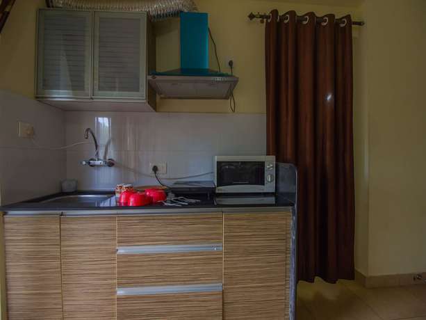 Imagen de la habitación del Hotel OYO 16442 Home Serene 1BHK Arpora. Foto 8