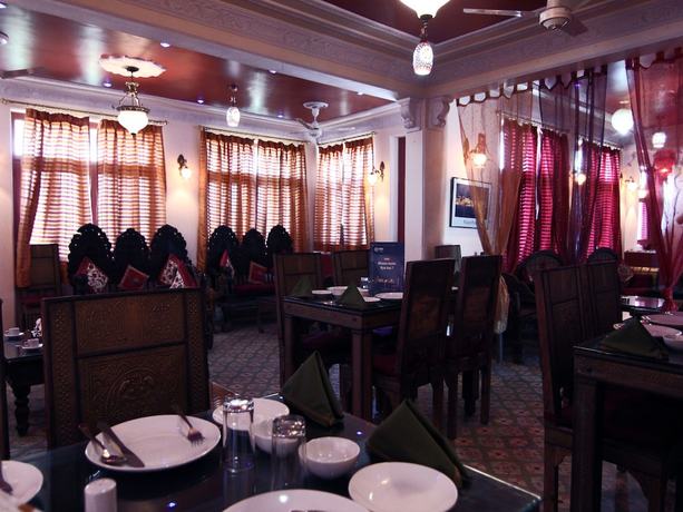Imagen del bar/restaurante del Hotel OYO 1656 Mandela House. Foto 5