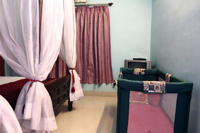 Imagen de la habitación del Hotel OYO 1656 Mandela House. Foto 14