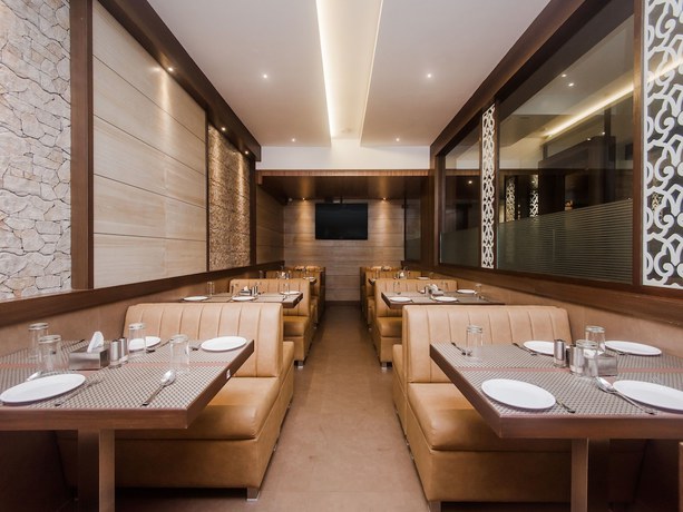 Imagen del bar/restaurante del Hotel OYO 16718 Aditya Residency. Foto 5