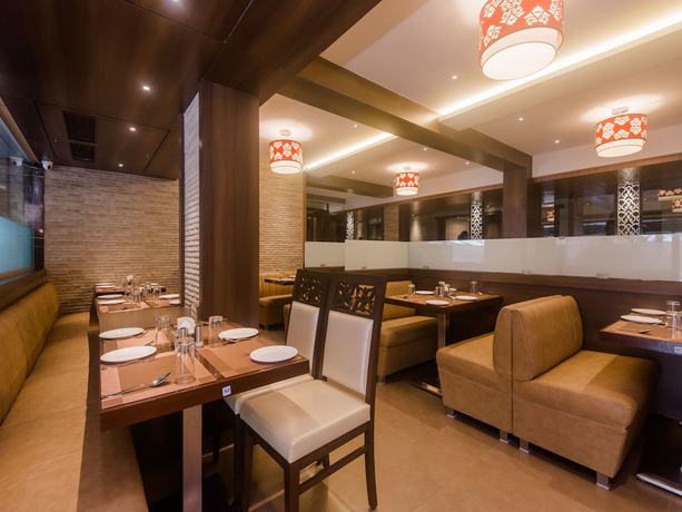 Imagen del bar/restaurante del Hotel OYO 16718 Aditya Residency. Foto 7