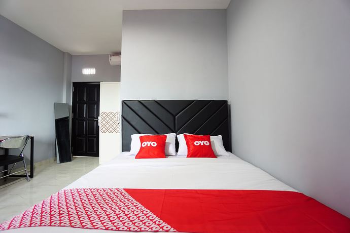 Imagen de la habitación del Hotel OYO 1680 Hanna Residence. Foto 10