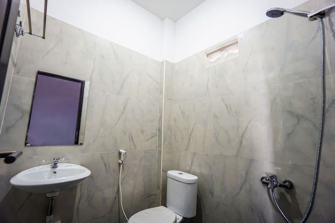 Imagen de la habitación del Hotel OYO 1680 Hanna Residence. Foto 11