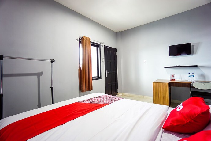 Imagen de la habitación del Hotel OYO 1680 Hanna Residence. Foto 12