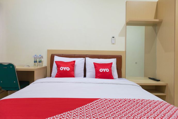 Imagen de la habitación del Hotel OYO 1681 The Kost Tdm 2. Foto 11