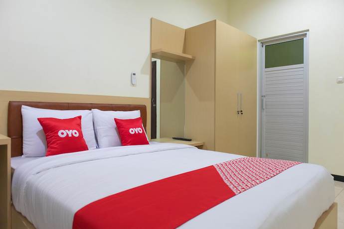 Imagen de la habitación del Hotel OYO 1681 The Kost Tdm 2. Foto 12