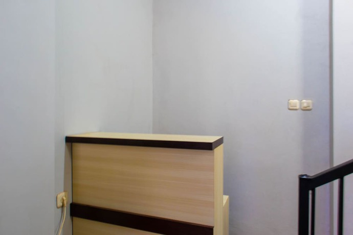 Imagen de los interiores del Hotel OYO 1681 The Kost Tdm 2. Foto 19