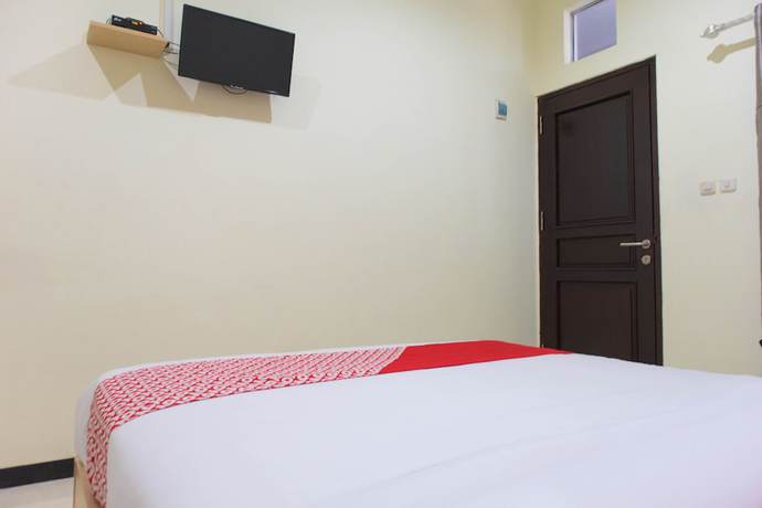 Imagen de la habitación del Hotel OYO 1681 The Kost Tdm 2. Foto 13