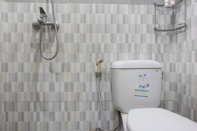 Imagen de la habitación del Hotel OYO 1681 The Kost Tdm 2. Foto 17