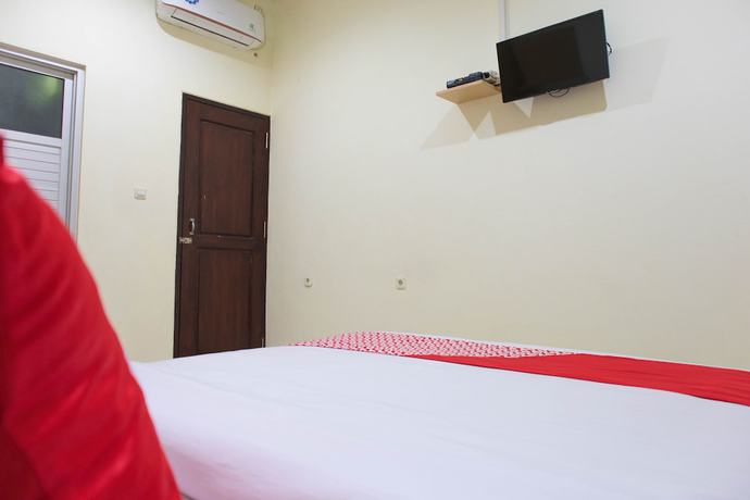 Imagen de la habitación del Hotel OYO 1681 The Kost Tdm 2. Foto 18