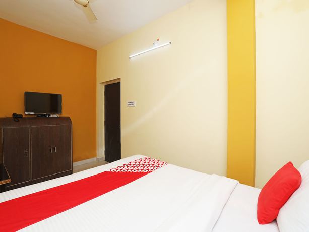 Imagen de la habitación del Hotel OYO 16821 Senapati Palace. Foto 11