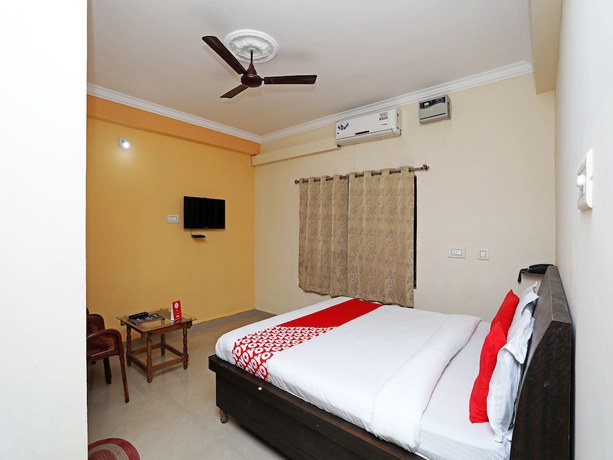 Imagen de la habitación del Hotel OYO 16821 Senapati Palace. Foto 13