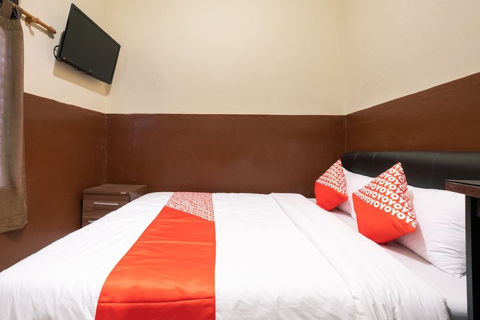 Imagen de la habitación del Hotel OYO 1700 Danurejan Guesthouse. Foto 2
