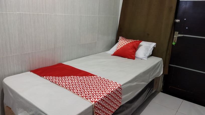 Imagen de la habitación del Hotel OYO 1700 Danurejan Guesthouse. Foto 4