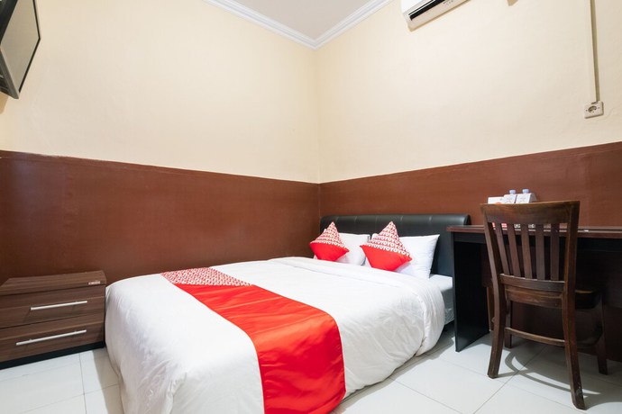 Imagen de la habitación del Hotel OYO 1700 Danurejan Guesthouse. Foto 7