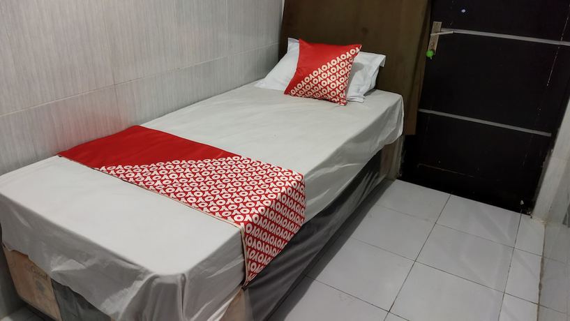 Imagen de la habitación del Hotel OYO 1700 Danurejan Guesthouse. Foto 11