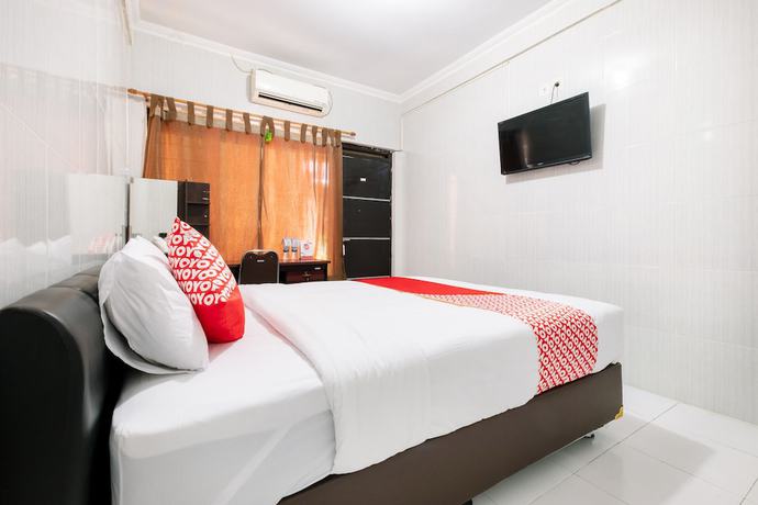 Imagen de la habitación del Hotel OYO 1700 Danurejan Guesthouse. Foto 12