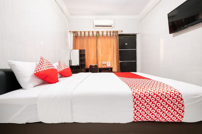 Imagen de la habitación del Hotel OYO 1700 Danurejan Guesthouse. Foto 13