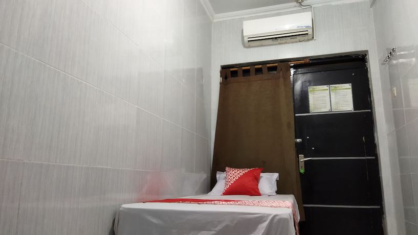 Imagen de la habitación del Hotel OYO 1700 Danurejan Guesthouse. Foto 14