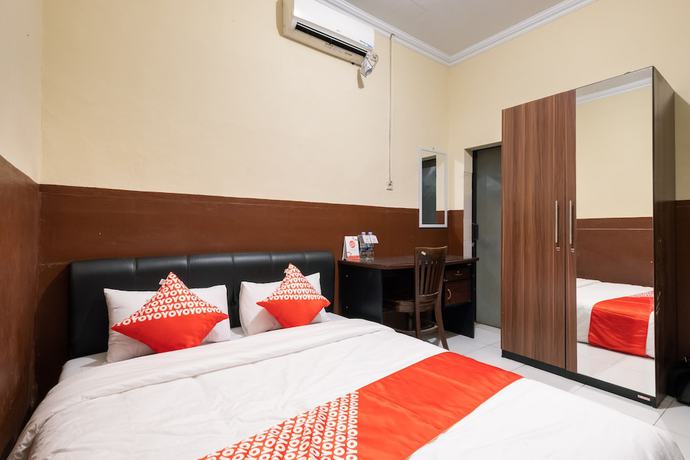 Imagen de la habitación del Hotel OYO 1700 Danurejan Guesthouse. Foto 15
