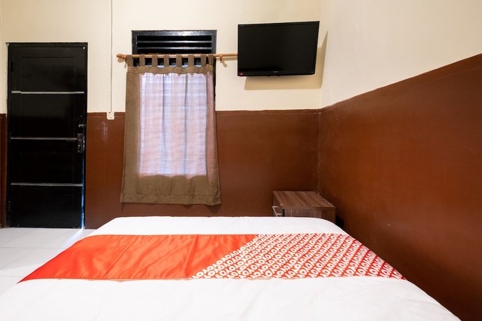 Imagen de la habitación del Hotel OYO 1700 Danurejan Guesthouse. Foto 16