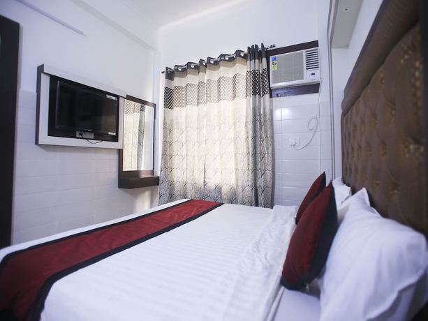 Imagen de la habitación del Hotel OYO 17006 Girnar. Foto 9