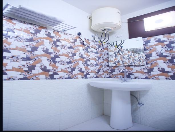 Imagen de la habitación del Hotel OYO 17006 Girnar. Foto 10