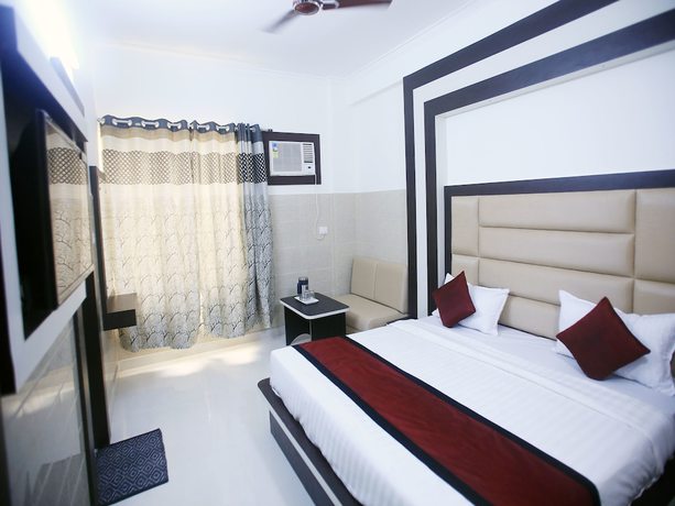 Imagen de la habitación del Hotel OYO 17006 Girnar. Foto 11