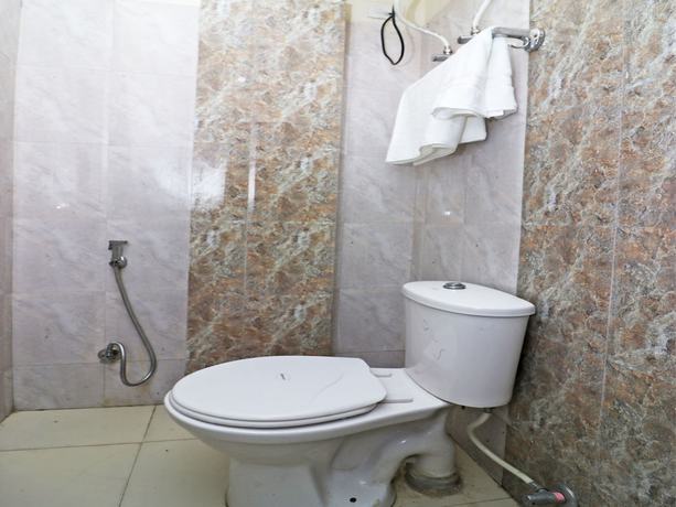 Imagen de la habitación del Hotel OYO 17006 Girnar. Foto 13