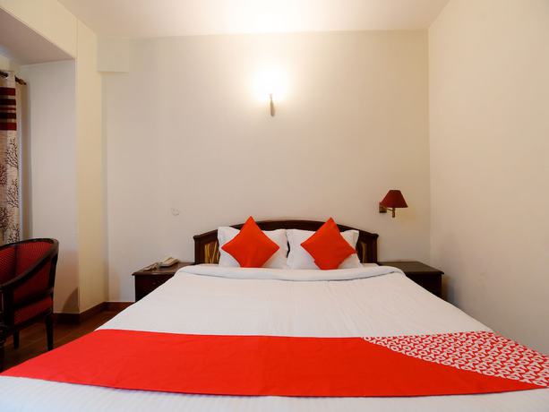 Imagen de la habitación del Hotel OYO 17097 Kenwood Resort. Foto 11