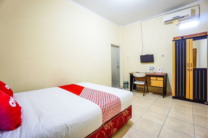 Imagen de la habitación del Hotel OYO 1720 A2b Residence. Foto 9