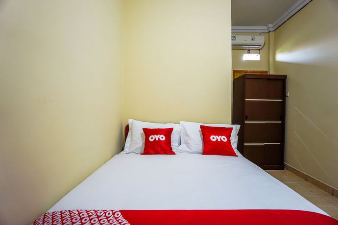 Imagen de la habitación del Hotel OYO 1720 A2b Residence. Foto 10