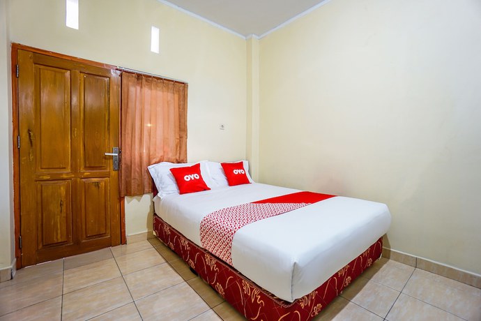 Imagen de la habitación del Hotel OYO 1720 A2b Residence. Foto 12