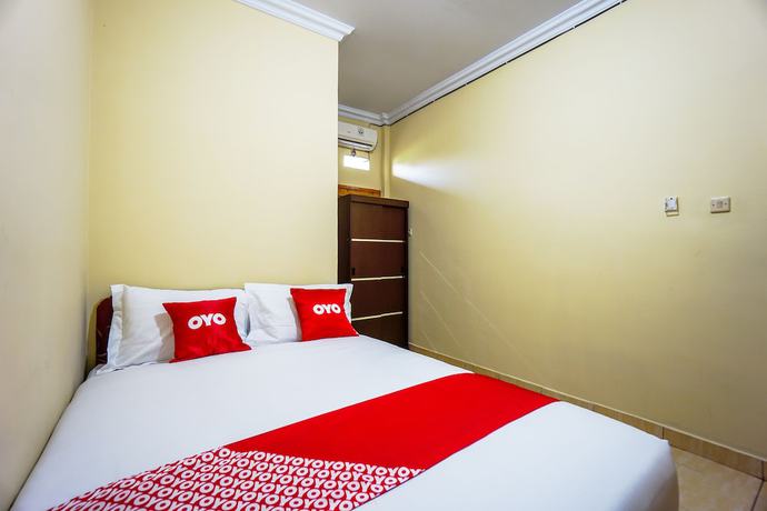 Imagen de la habitación del Hotel OYO 1720 A2b Residence. Foto 13