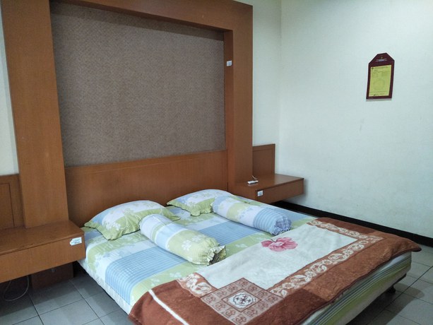 Imagen de la habitación del Hotel OYO 1740 Tekmira Residence Supratman Syariah. Foto 8