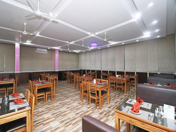 Imagen del bar/restaurante del Hotel OYO 17422 Sidra Guest House. Foto 5