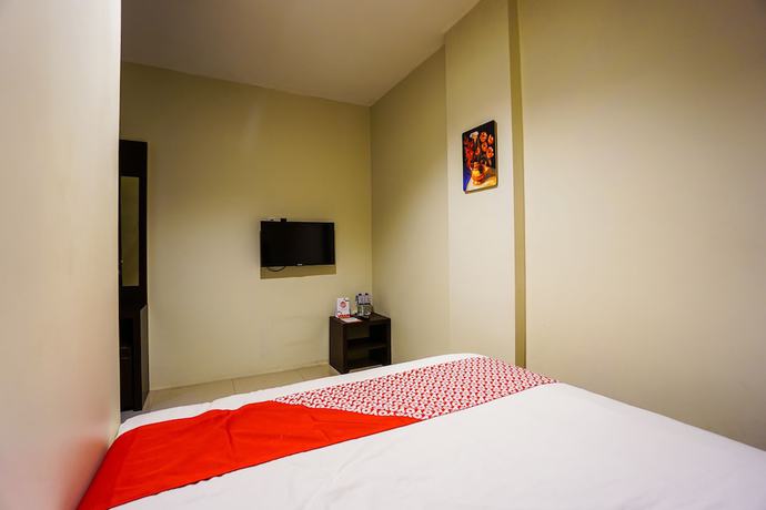 Imagen de la habitación del Hotel OYO 1769 Rid\'s. Foto 6
