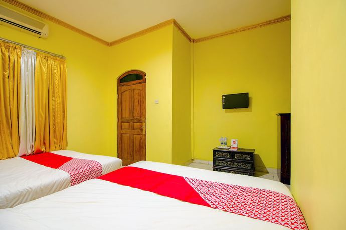 Imagen de la habitación del Hotel OYO 1770 Mawar Saron 2. Foto 5
