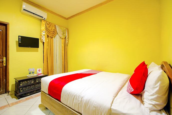 Imagen de la habitación del Hotel OYO 1770 Mawar Saron 2. Foto 8